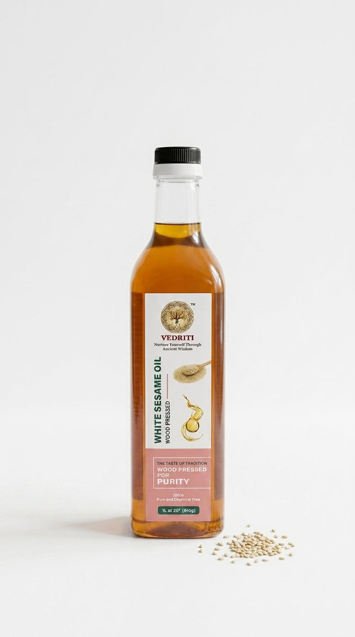 Vedriti Wood Pressed White Sesame Oil bottle on white background